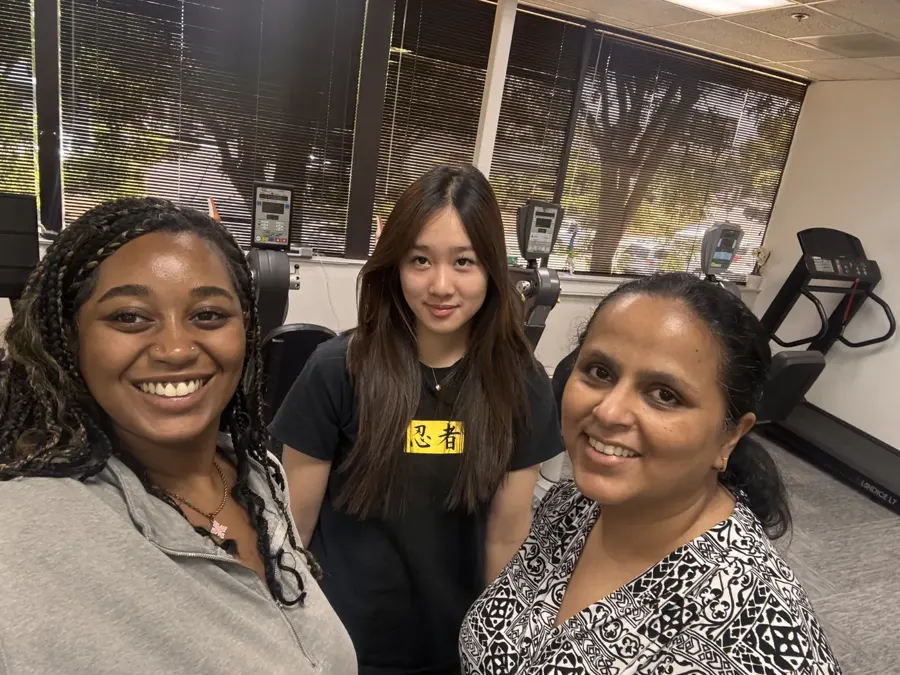 Summer intern with Cupertino Physical Therapy staff in the clinic gym