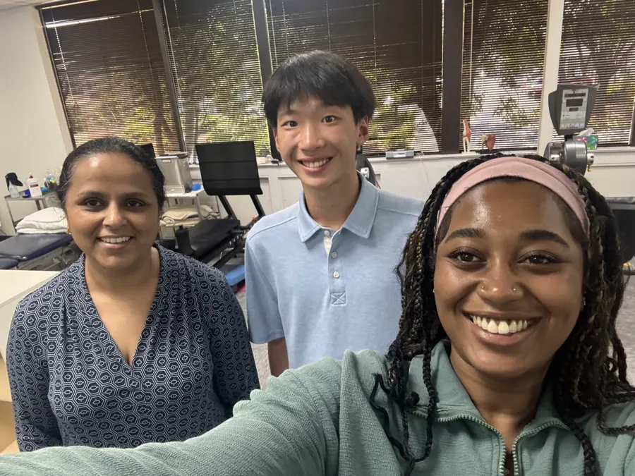 Summer intern with Cupertino Physical Therapy staff in the clinic gym