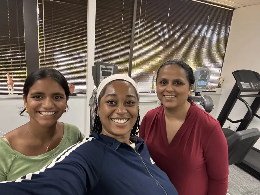 Summer intern with Cupertino Physical Therapy staff in the clinic gym