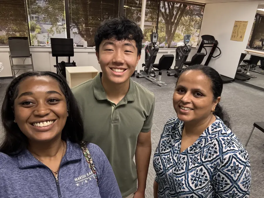 Summer intern with Cupertino Physical Therapy staff in the clinic gym