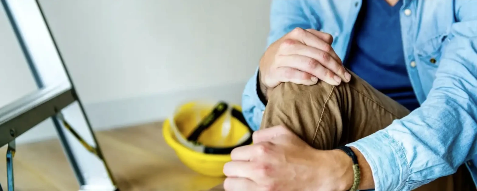 Physical therapist guiding a client through an injury prevention screen