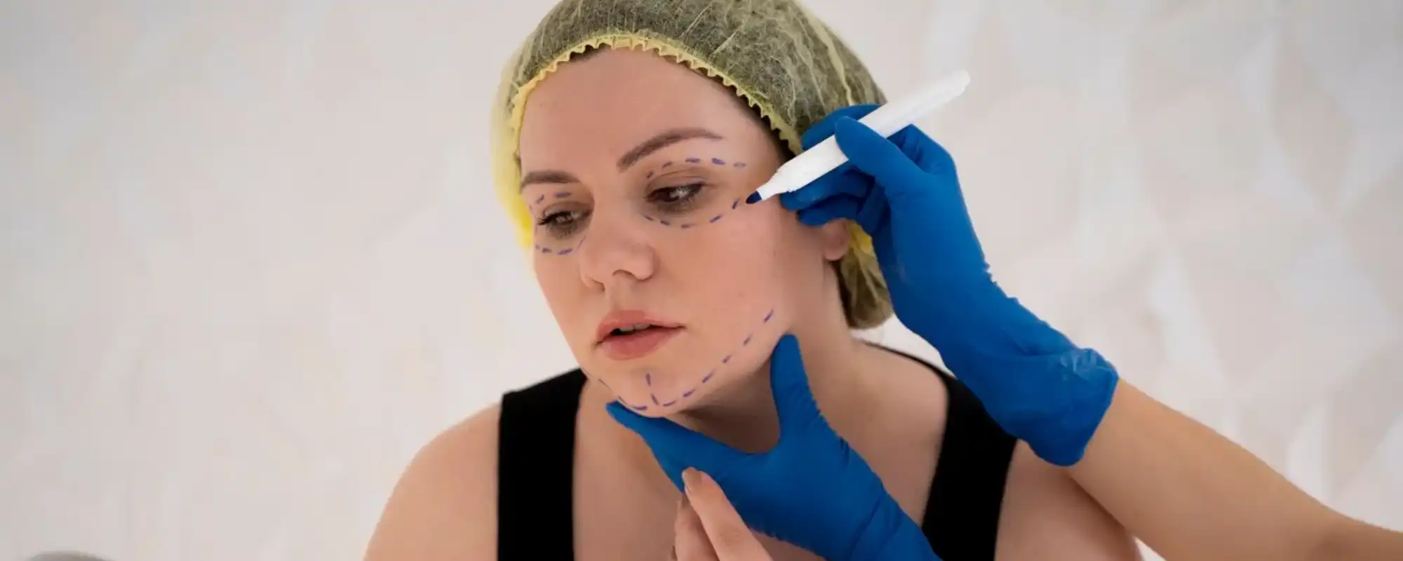 young-woman-with-marker-traces-face_23-2149350078 (1) (2)